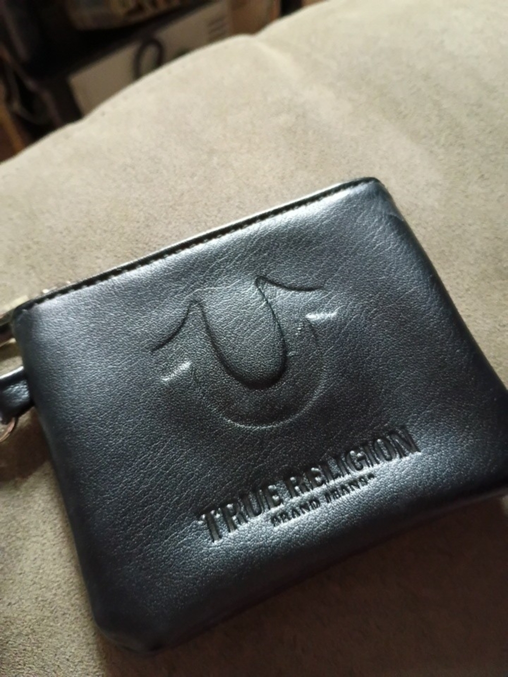 True Religion Black Leather Men's Bi-Fold Wallet with Embossed Logo